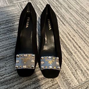 Never been worn Prada heels with beautiful decorative piece.